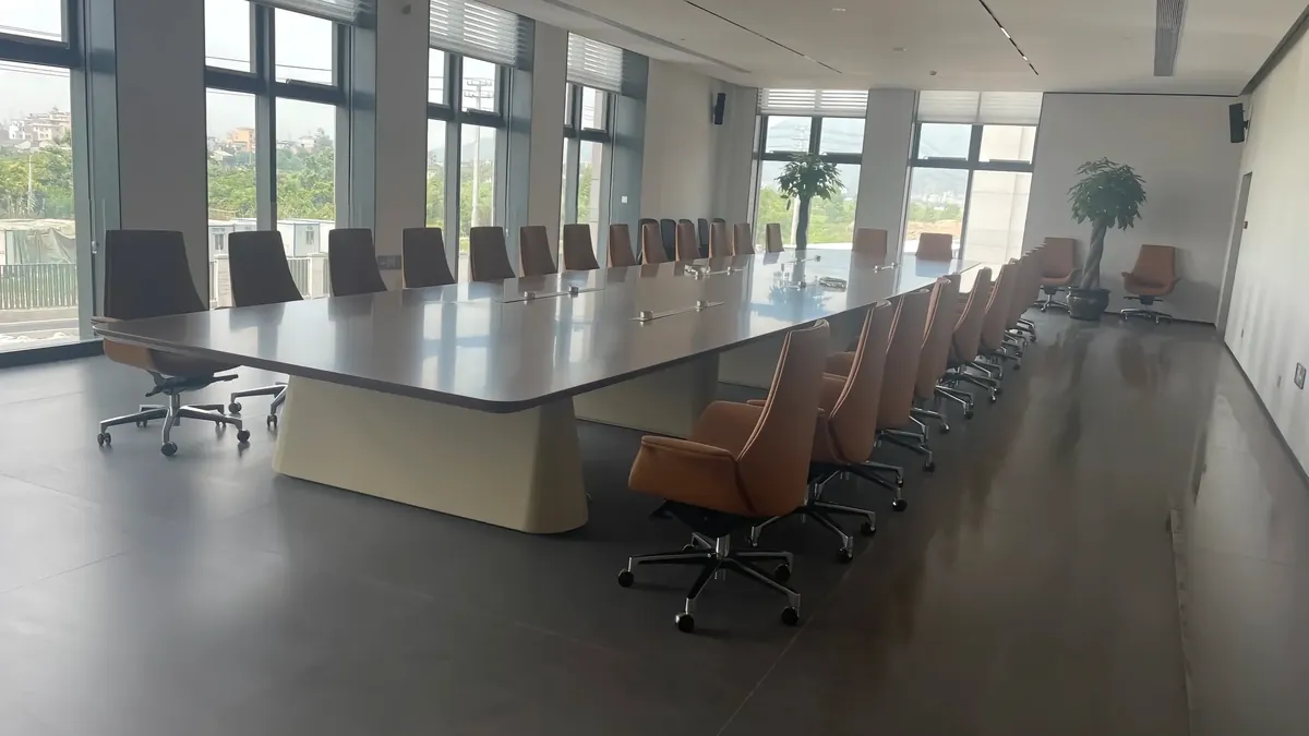 Real business meeting room used to coordinate product and project requirements